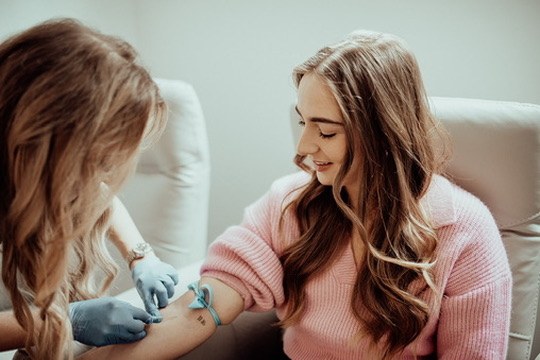 Stephanie Eschak, NP, drawing blood for comprehensive lab panels at Juvenescence Wellness in Lake Cowichan, BC